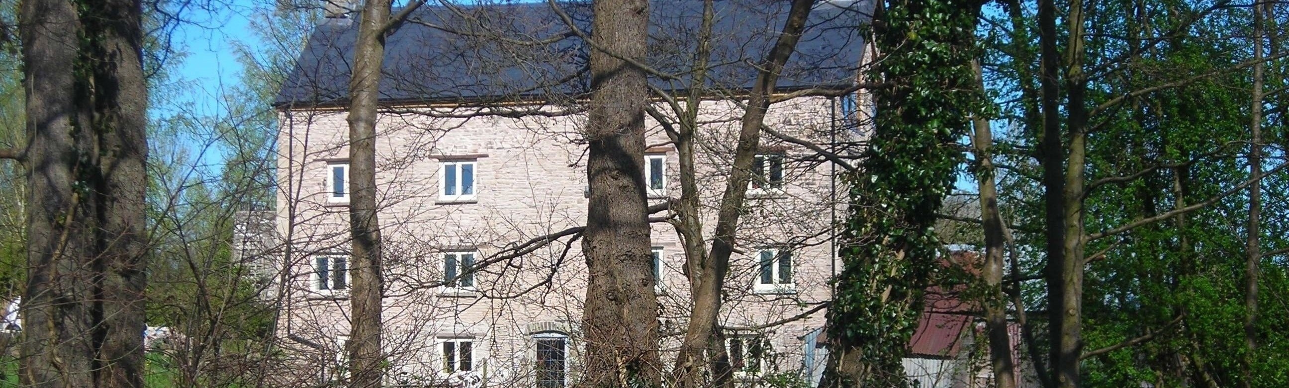 Photo of The Old Storehouse, seen from the canal